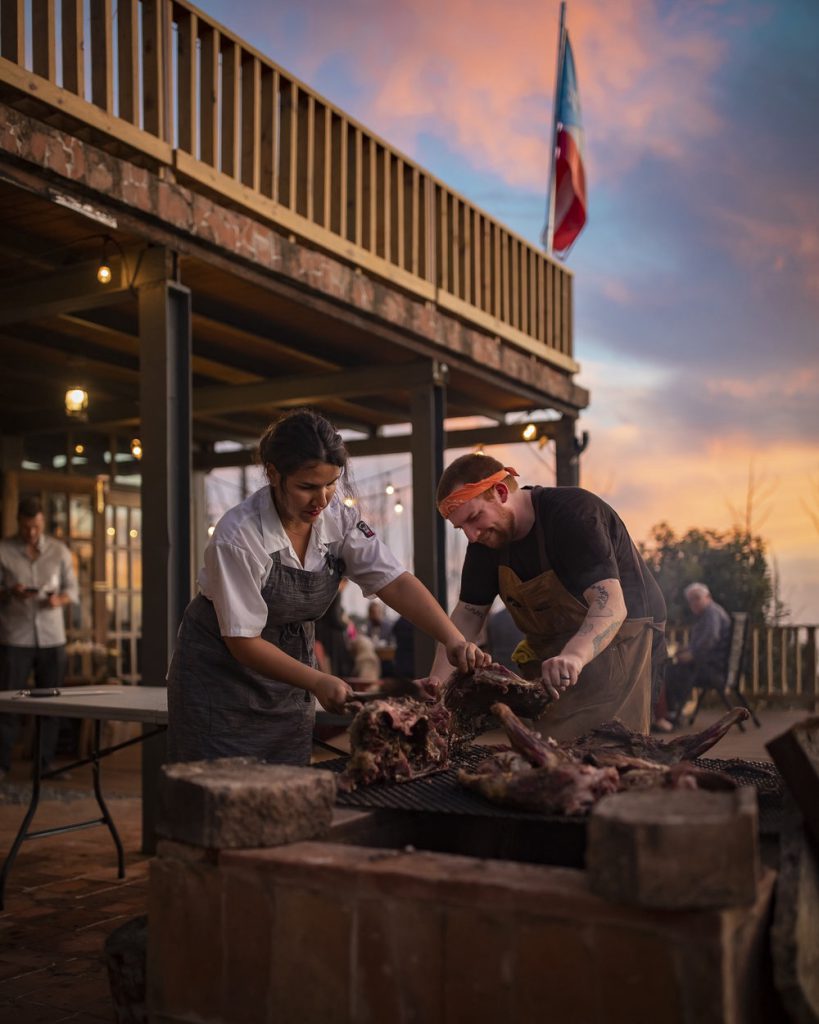 Roasting pigs at El Pretexto