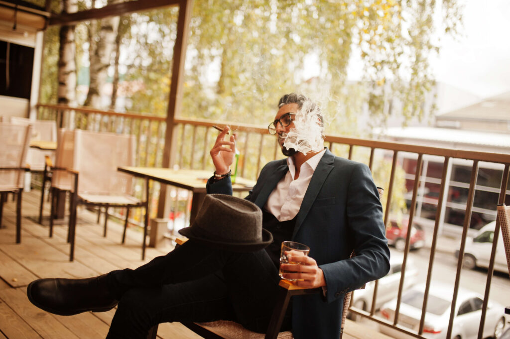 Man enjoying a cigar | Source: AS Photo Studio