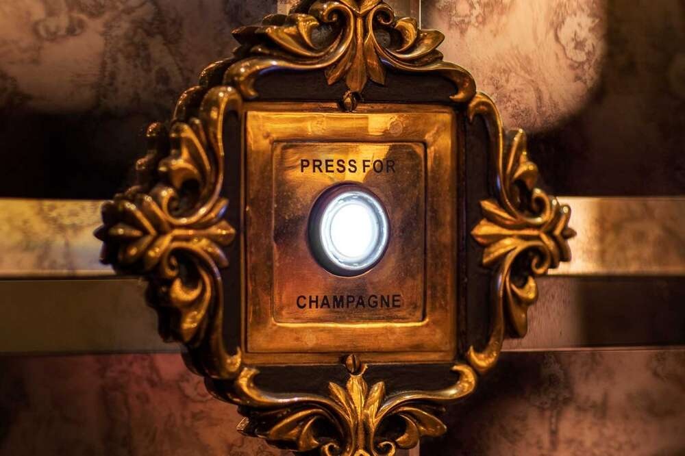 The champagne bell at Rosina | Source: Thrillist