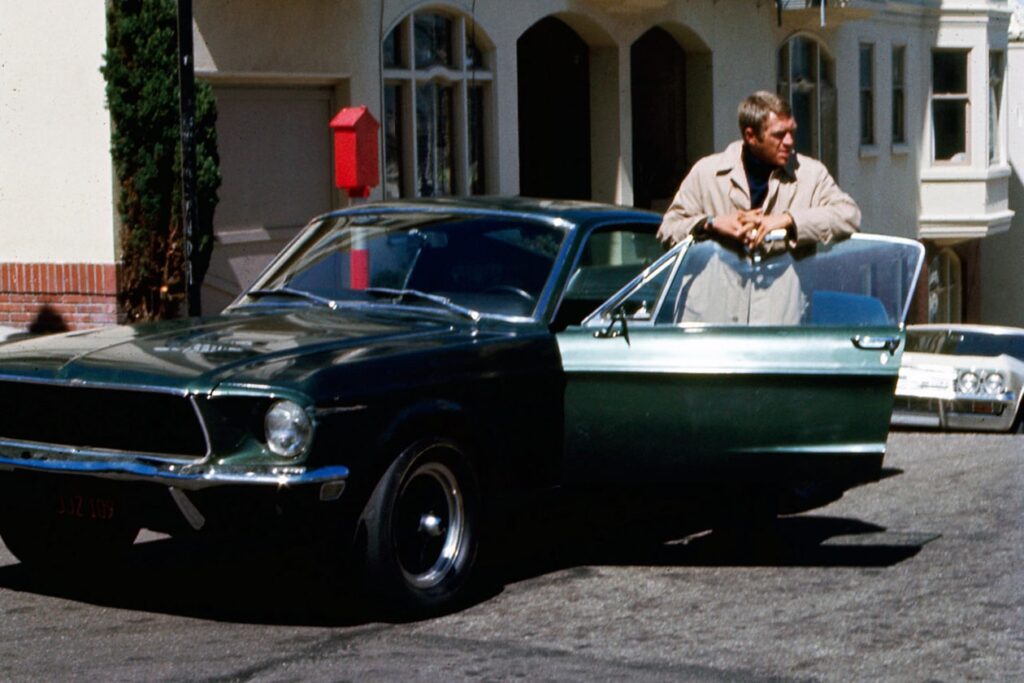 Steve McQueen with his 1968 Ford Mustang GT in Bullit